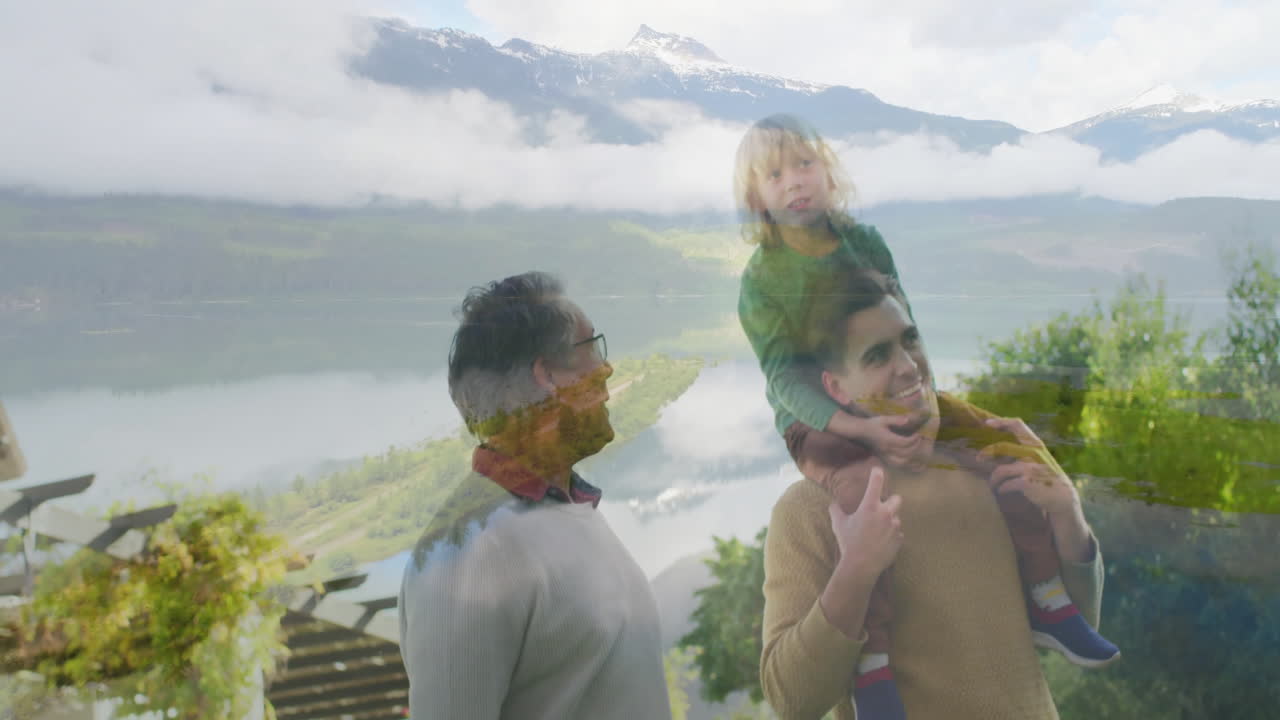 Three generations standing on terrace overlooking valley, showing animated health chart