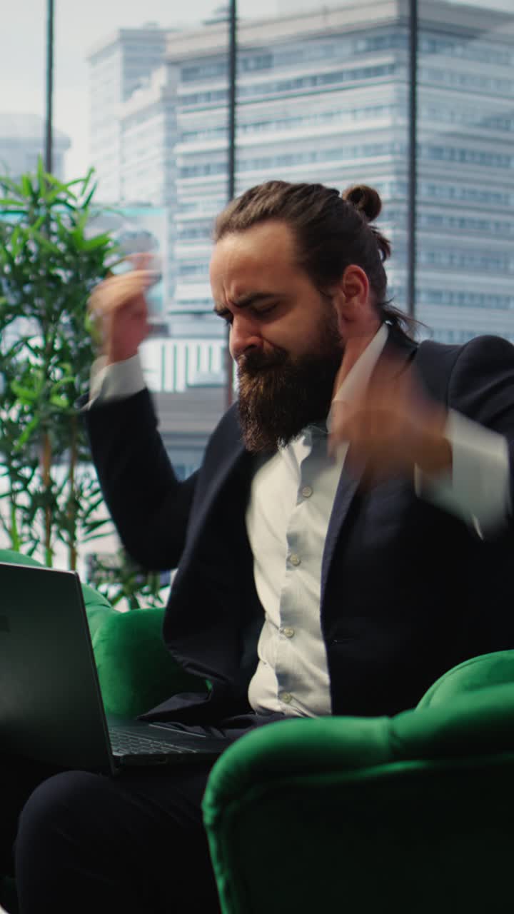 Vertical Video Proud satisfied CEO mimics air guitar singing and celebrating achievement