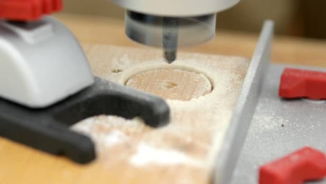 circular hole saw drill bit in action, close-up