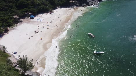 Aerial-view-wild-beach-big-city-​​Rio-de-Janeiro,-Brazil