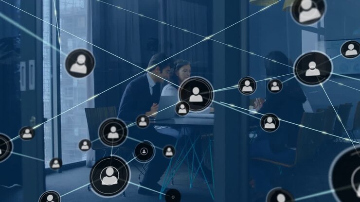 Animation of network of connections with icons over diverse businesspeople in office