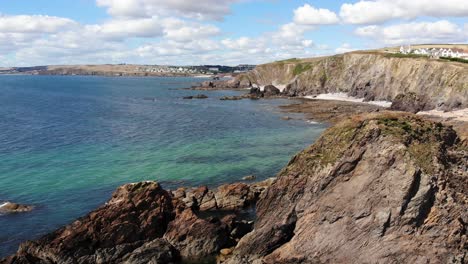 Aerial-View-Along-Hope-Cove-And-Coastline-In-South-Devon-On-Clear-Sunny-Day