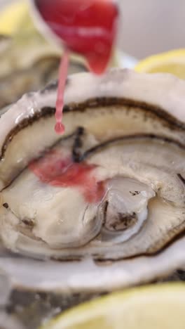 fresh oysters with red sauce