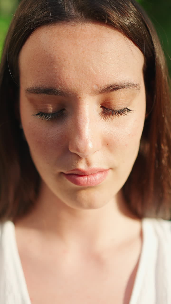 Close-up portraits of a smiling woman