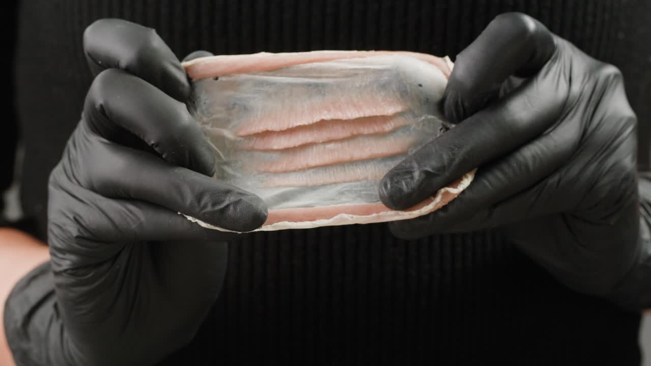 Make-up artist making fake scars and wounds close-up. Makeup equipment props for films and shooting. Bloody fake fingers for halloween and parties