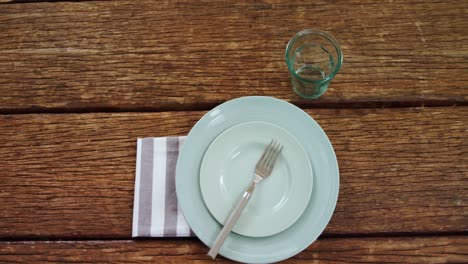 various cutlery on wooden table 4k