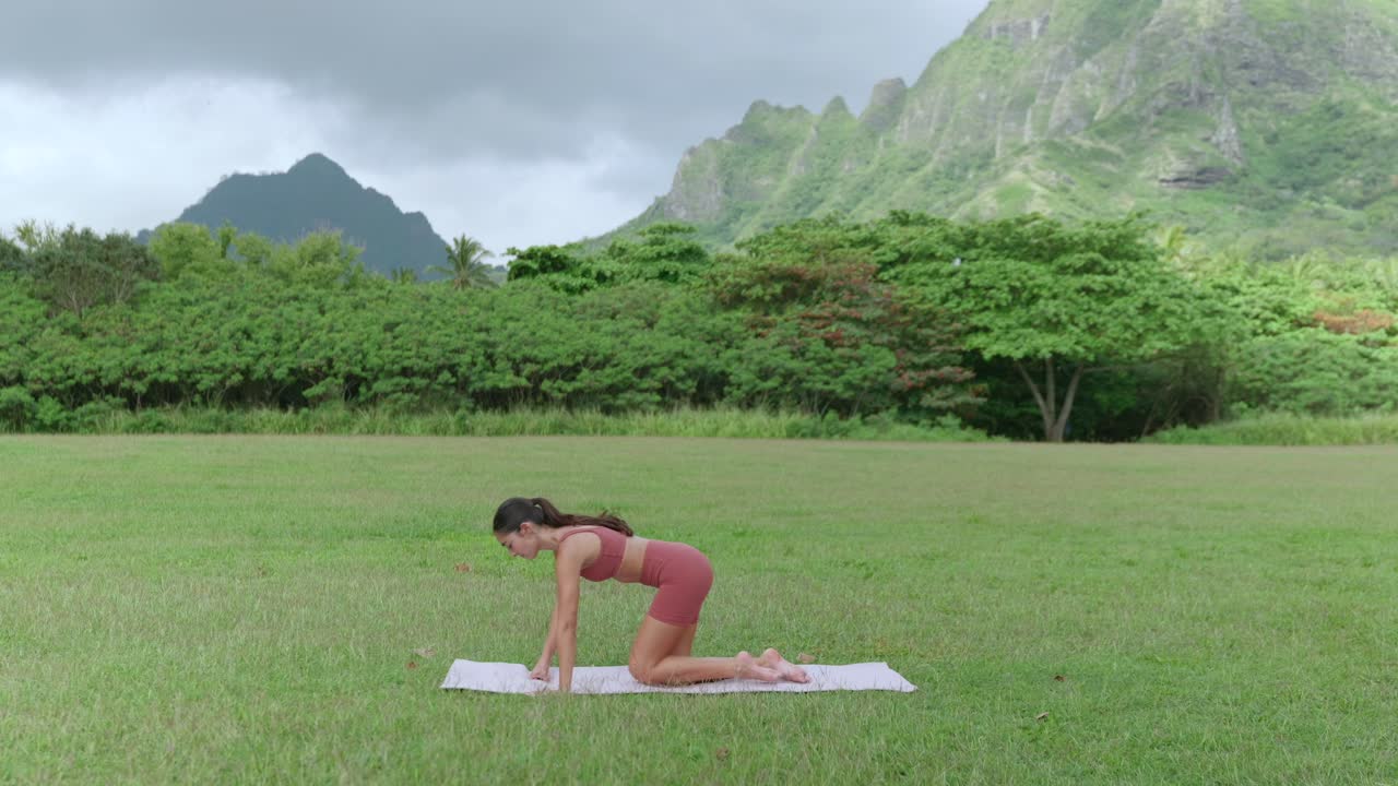 Fitness model doing yoga, leg stretch
