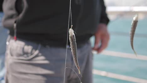 man fishing and caught a fish