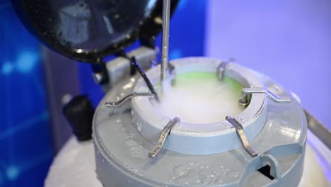 steam and gases of liquid nitrogen come from an open pressure vessel, blue background, chemical applications