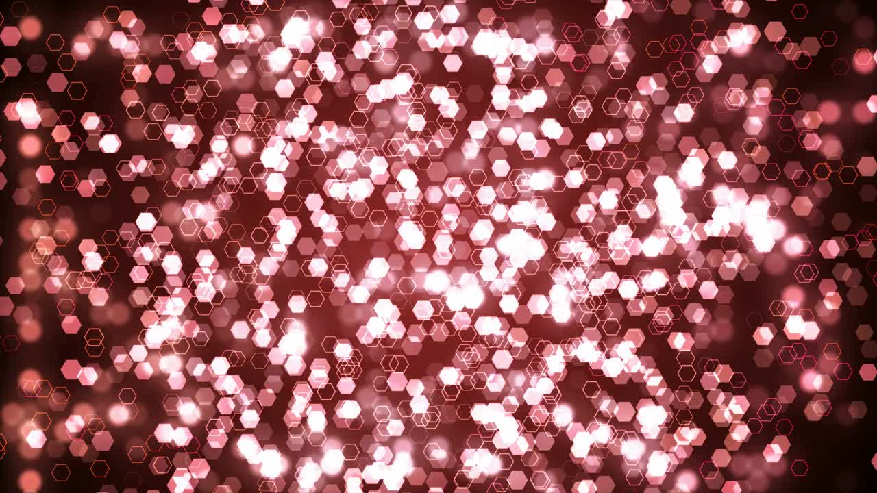 Rose gold glitter hexagon sparkles on dark background. Abstract animation.