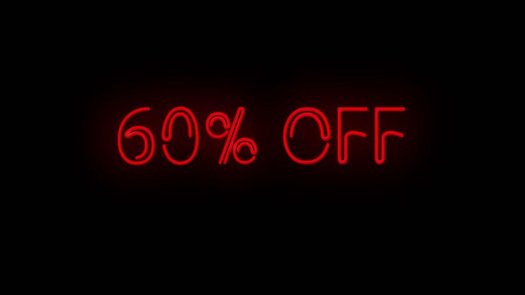 Insegna al neon rossa lampeggiante con '60% DI SCONTO' su sfondo nero, che si accende e si spegne con sfarfallio