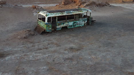 graffiti covers abandoned magic bus in chile desert altiplano, tourism