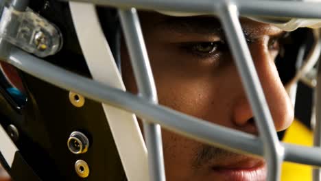 american football player with a head gear 4k