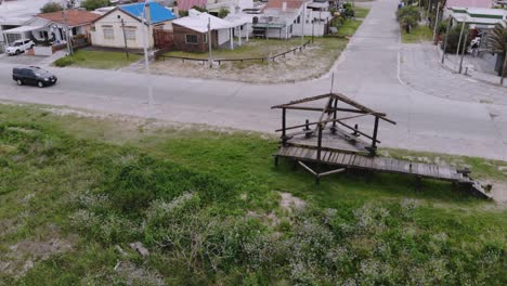 Aerial-video-of-a-wooden-structure-on-the-coast