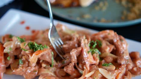 beef salad with sauce on a plate