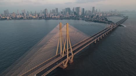 cinematic aerial view of bandra worli sea link in mumbai, india.