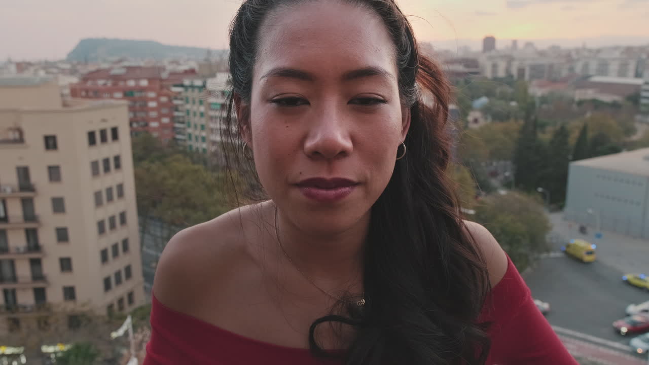 Woman on a Rooftop with City View