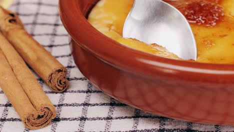 Spanish traditional food, catalonian dessert, crema catalana, catalan cream, spanish dessert close up, cooking.