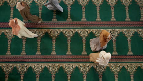 people praying in a mosque