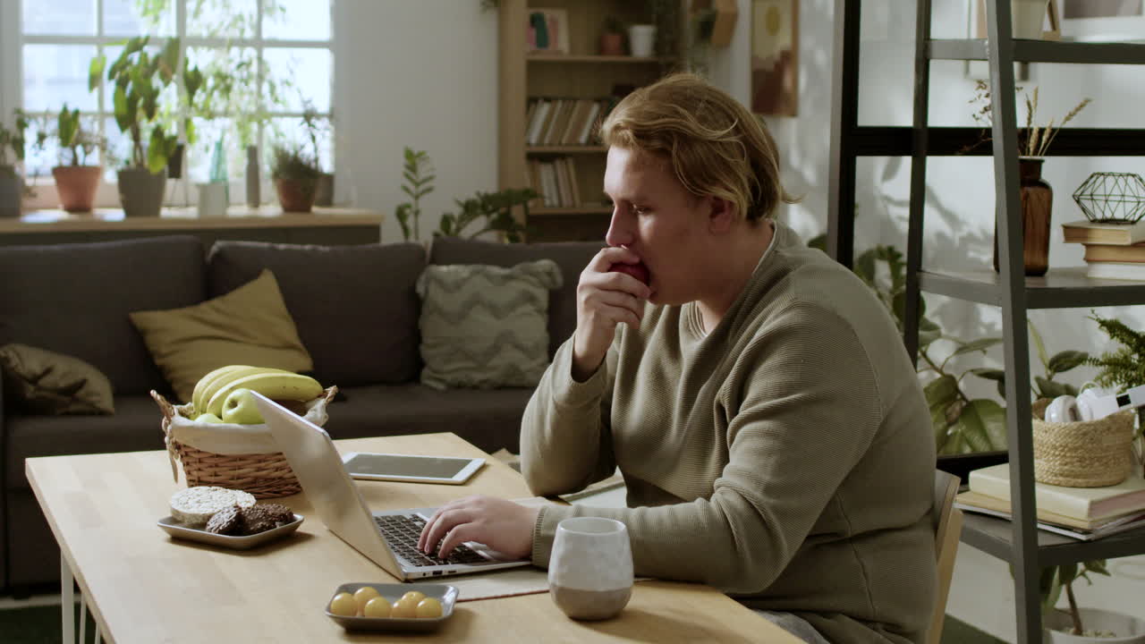 Teenager using laptop on the table