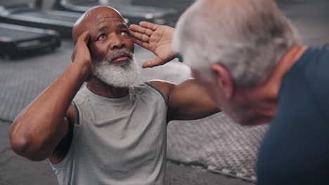 senior men exercising in the gym