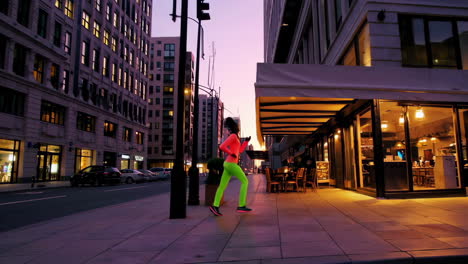 woman running in city at dawn/dusk