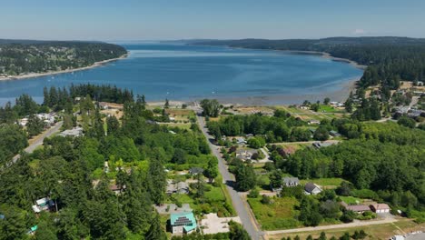 Drone-shot-pushing-towards-Holmes-Harbor-in-Freeland,-WA