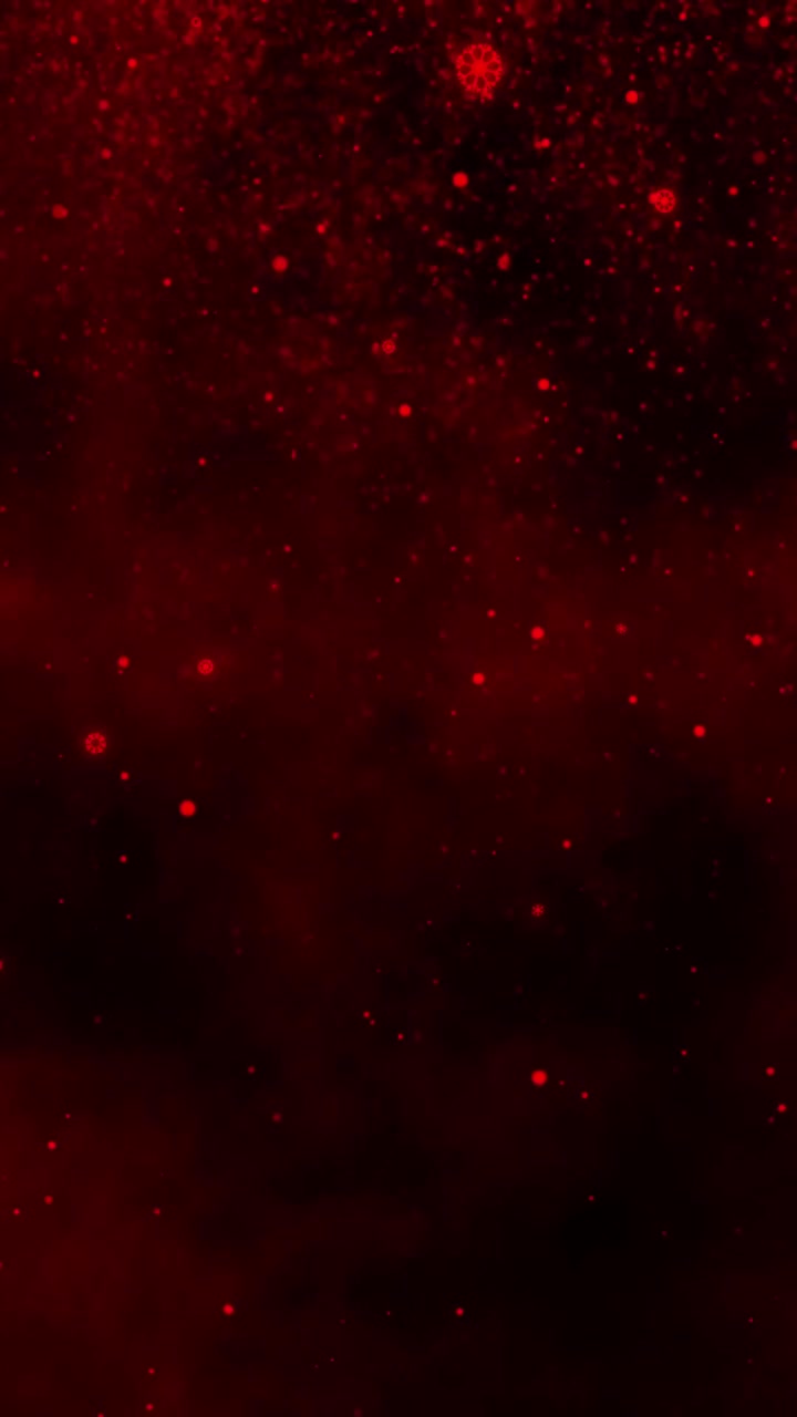 Sfondo rosso scuro in formato verticale con particelle di neve che cadono luminose ed effetto bokeh per le festività natalizie, loop continuo