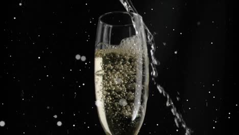 animation of champagne pouring in glasses and lens flare moving on black background