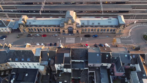 aerial view of a european train station and surrounding town