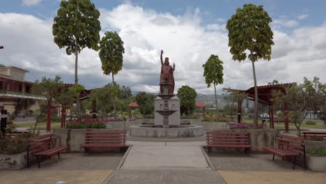 tourist sightseeing inca emperor atahualpa statue in peru, hyperlapse