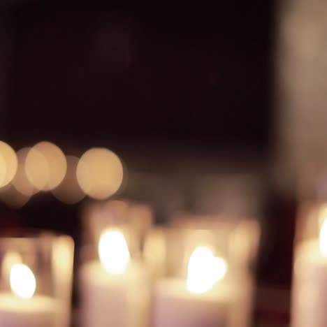 table set for an event party or wedding reception. decorative candles burning on a banquet table