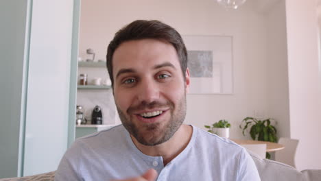 happy-young-man-having-video-chat-using-webcam-at-home-waving-at-baby-sharing-lifestyle-father-enjoying-online-connection-on-horizontal-screen