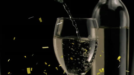 animation of confetti over glass of white wine on black background