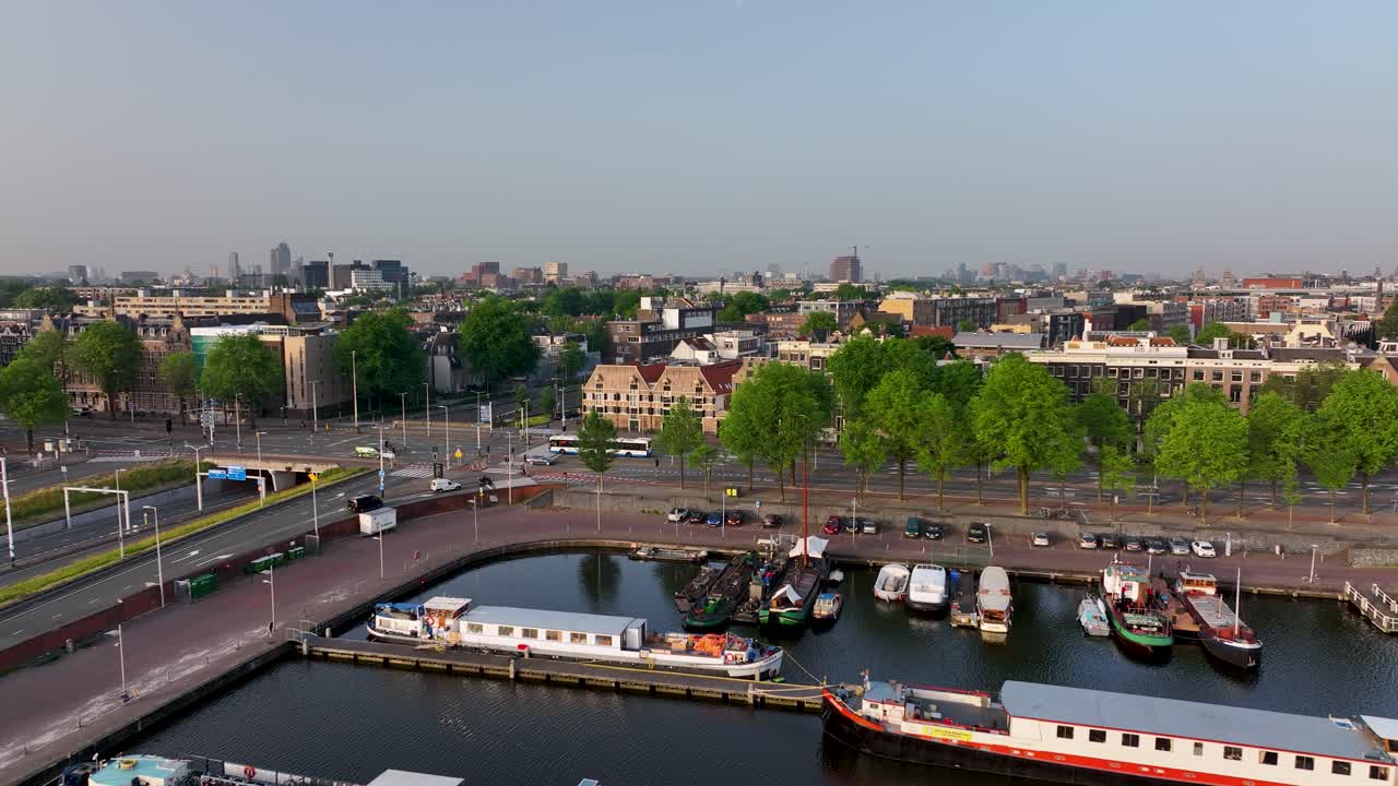 Aerial View of houseboats and vessels docked in Amsterdam harbor