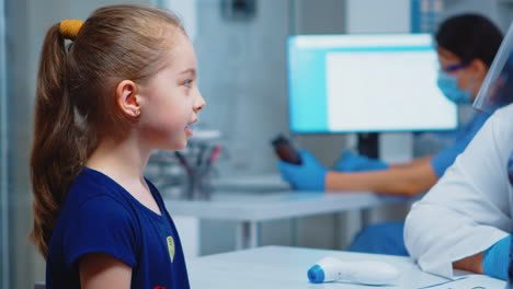 close up of girl portrait talking with doctor