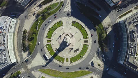 drone footage of marques de pombal square. aerial view of traffic on most iconic roundabout in the city of lisbon, portugal