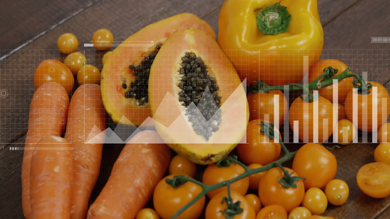 Data processing animation overlaid on papaya, carrots, and tomatoes in motion