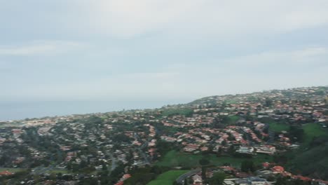 midday drone view and doing panorama movement to the right above the palos verdes estates, california