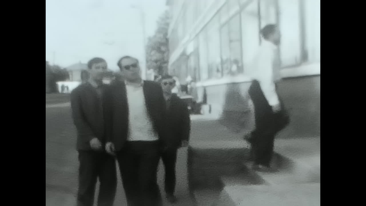 People at a river beach and swimming