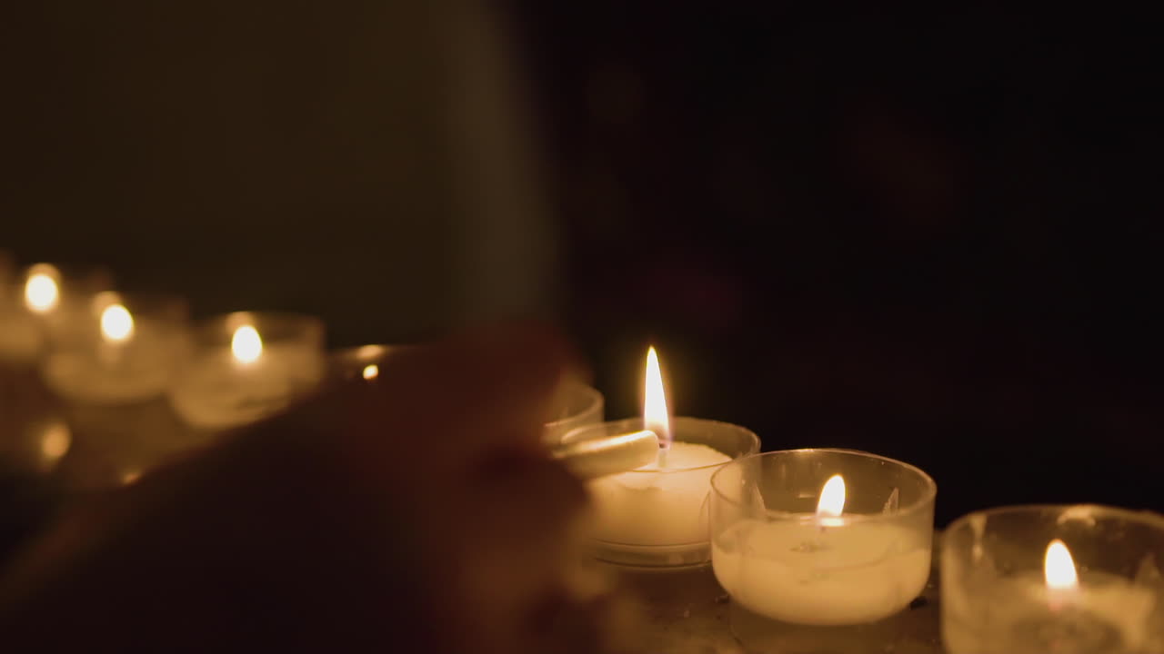 Lighting A Candle In A Catholic Church In Italy Slow Motion