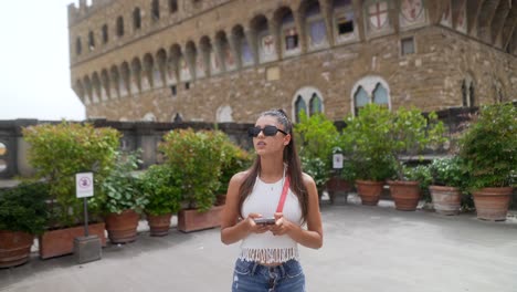 tourist in florence using a smartphone
