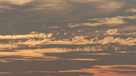 close up clouds with light during sunset time nature background time lapse footage, red orange blue sunset sky cloud 4k zoom in effect.