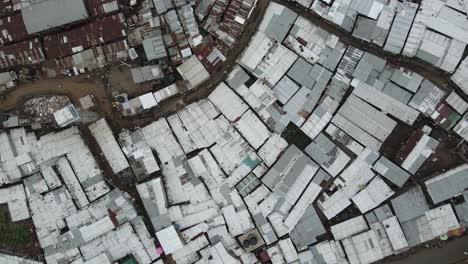 Birdseye-aerial-view-of-Kibera-slum,-shanty-poor-neighborhood-of-Nairobi,-Kenya