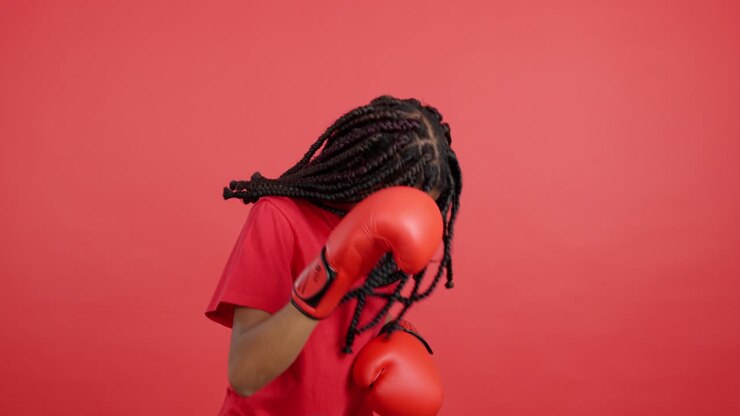 Young woman boxing