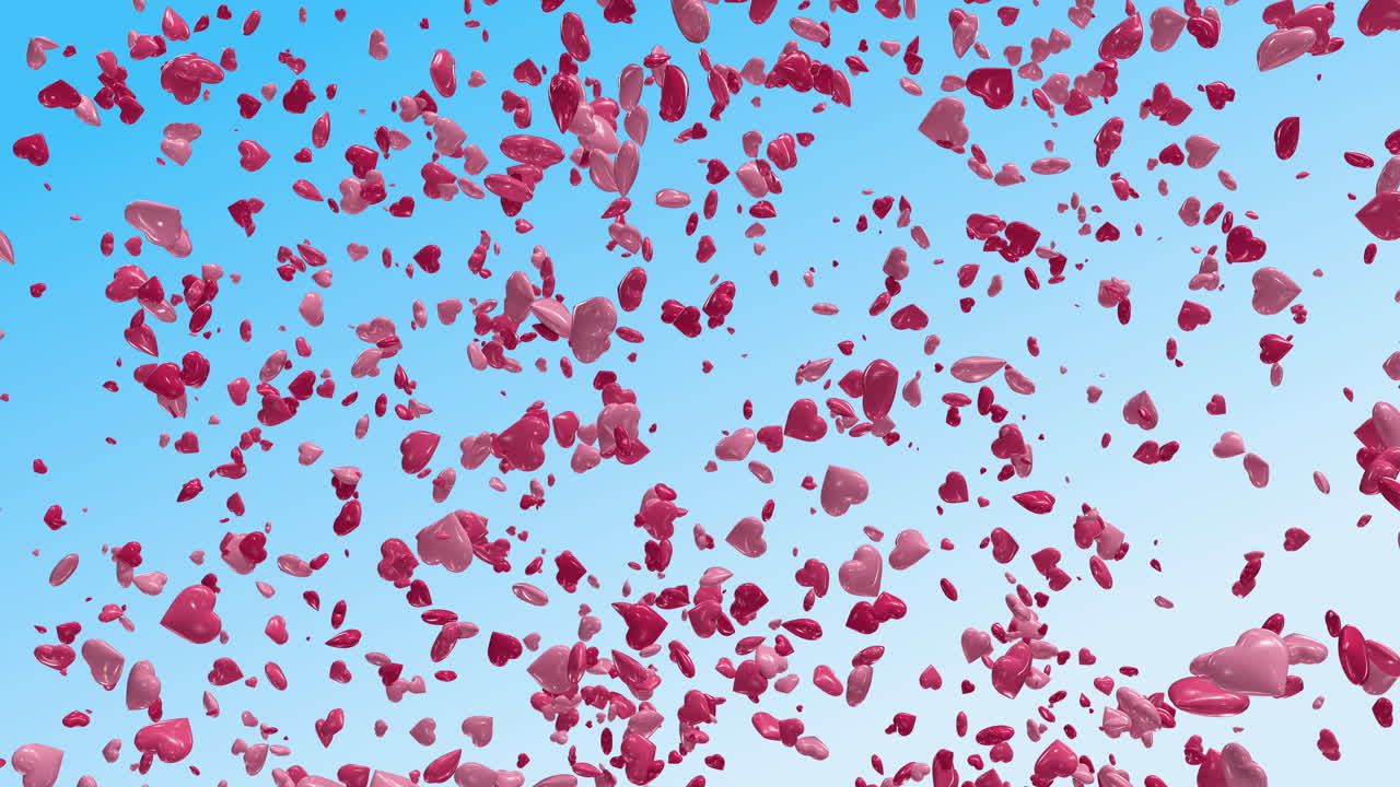 Cuori rosa e rossi che cadono su uno sfondo di cielo blu
