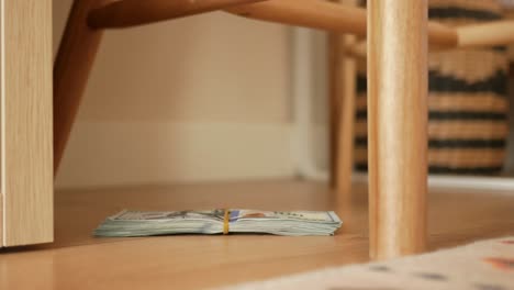 money hidden under chair