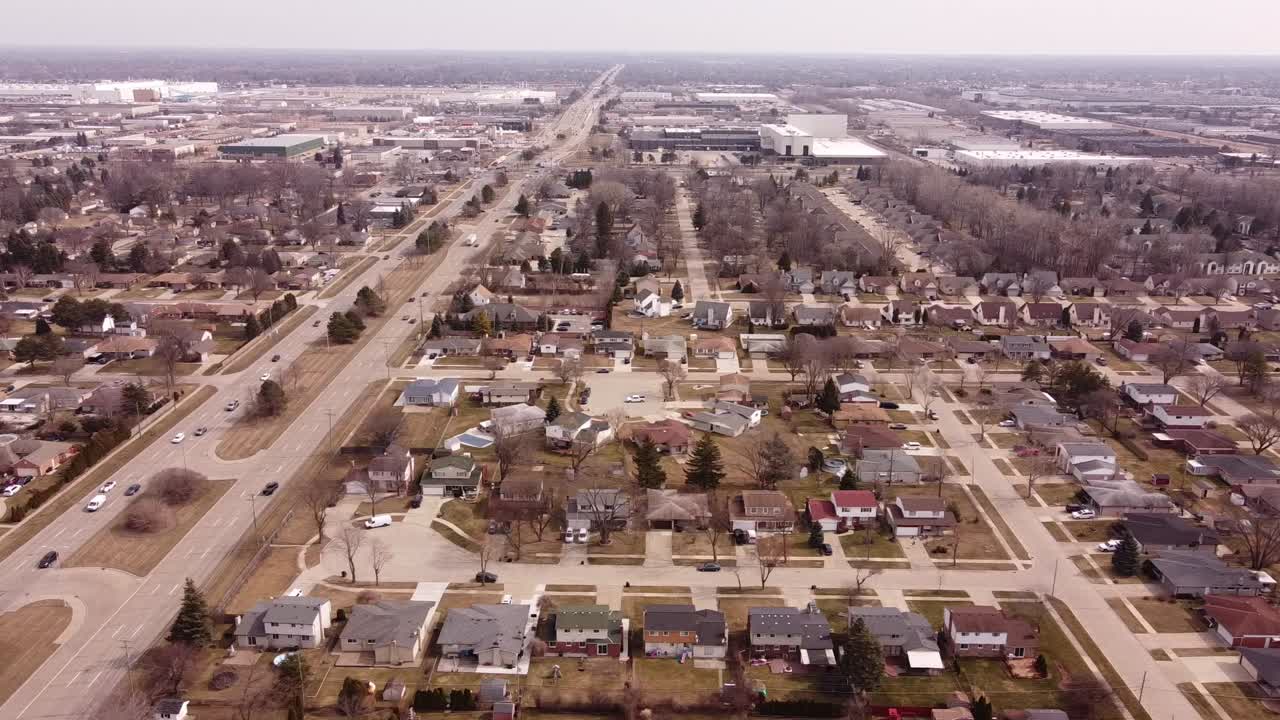 Aerial View Of Traffic At Metro Parkway Passing By City Of Sterling Heights In Michigan, USA