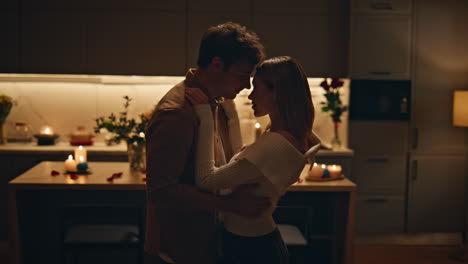passionate couple dancing home kitchen close up. happy lovers moving slowly