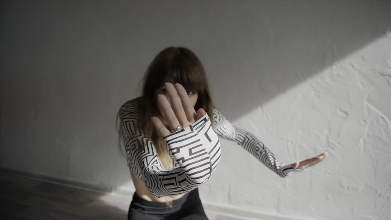 Stylish Woman Posing in a Patterned Outfit